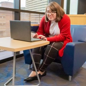 Young woman looking at a laptop