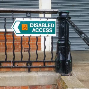 Disabled Access sign on a railing