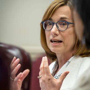 Woman speaking and using hand gestures